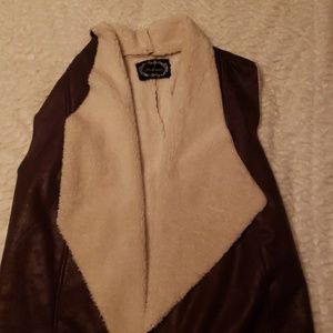 Brown and white vest